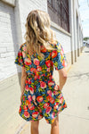 Sunny Days Floral Print Smocked Waist Back Neck Button Romper