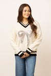 Silver Sequin Bow on Cream Varsity Sweater