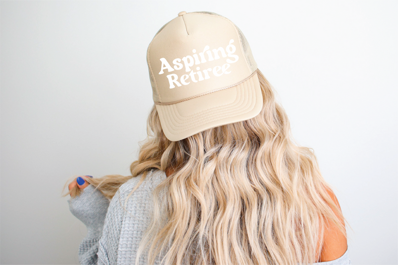 Aspire To Retire DTF Printed Khaki Trucker Hat White writing